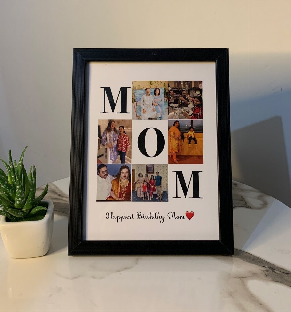 Black picture frame with a family photo collage and birthday message for mom.