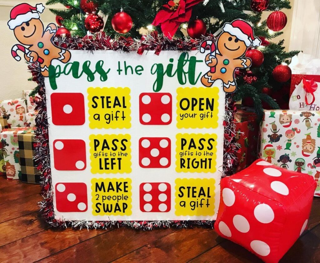 Pass the Gift game board with dice rules next to a Christmas tree